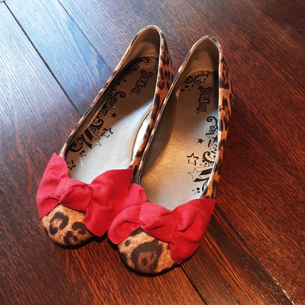 Leopard print flats with red bow.
